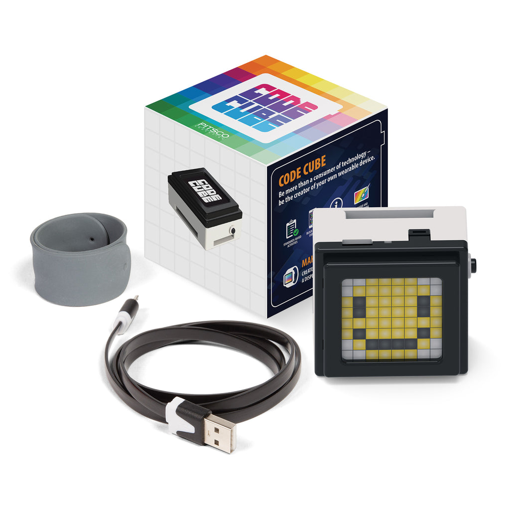 Code Cube with smiley face display, slap band, charging cable, and box